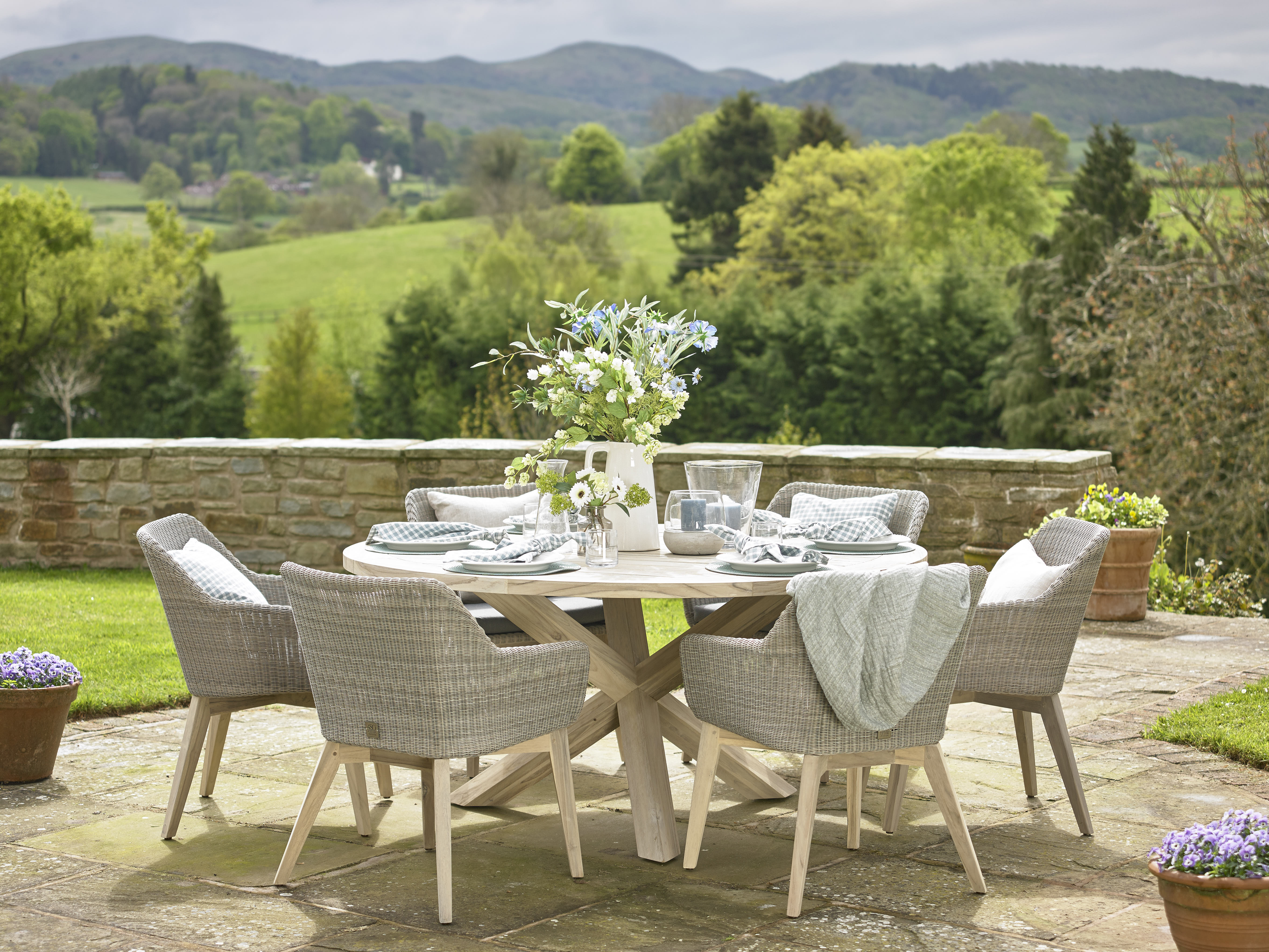 Louvre round teak dining table